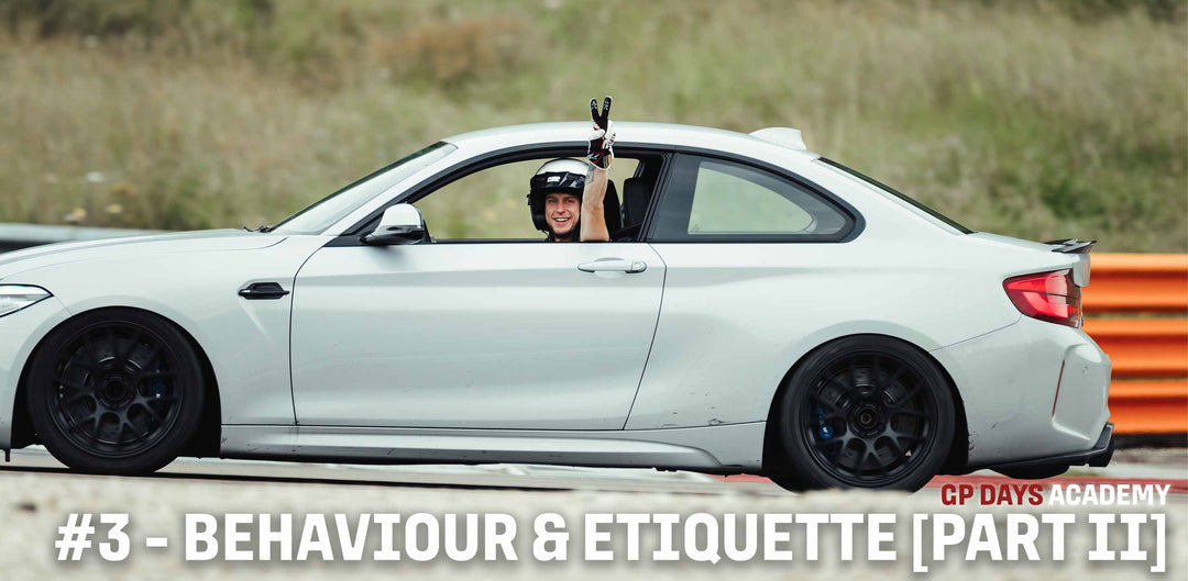 A driver waving from their car during a GP Days Open Pitlane Track Day at Dijon Prenois