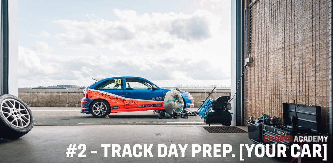 Man changing tyres of his Track Tool during a GP Days Open Pitlane Track Day